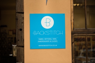 Backstitch Sign